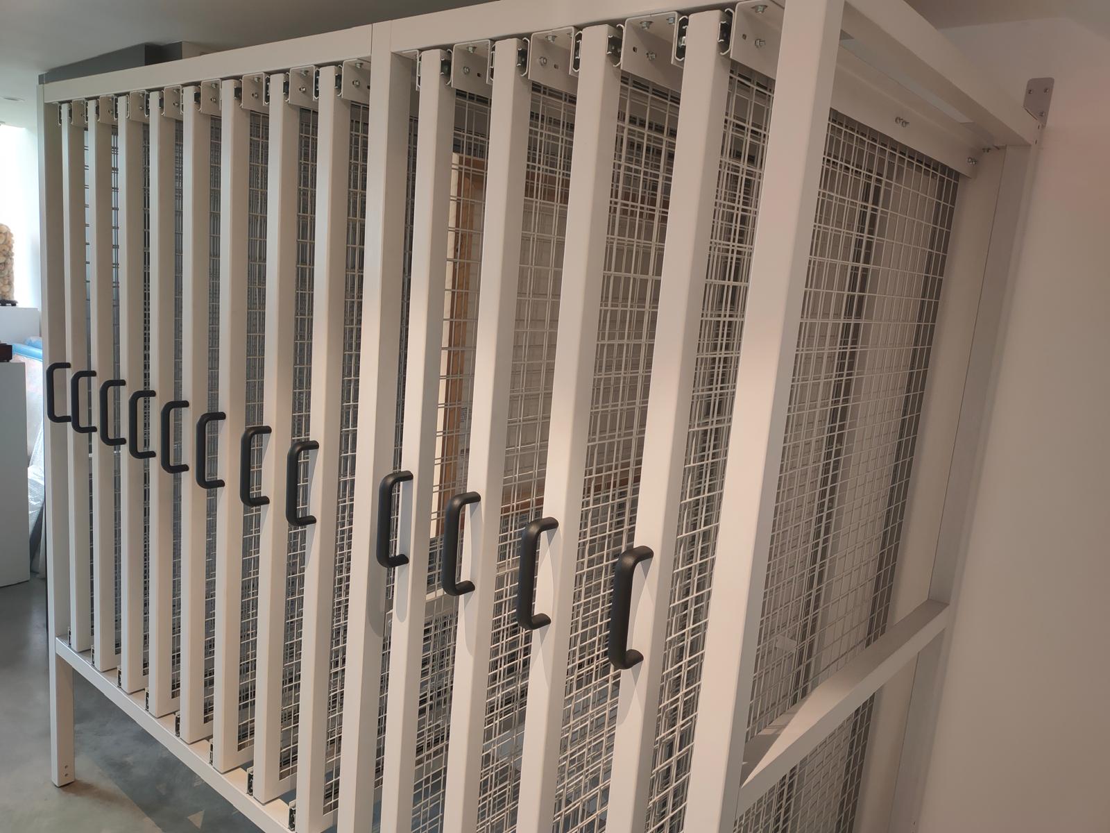 Rackstor wall-mounted mesh panels for framed artwork storage